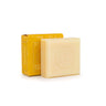 Bar of soap with a yellow box on a white background