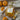 Sunflower Fields scented hand wash and lotion set with pumpkins on a beige fabric background